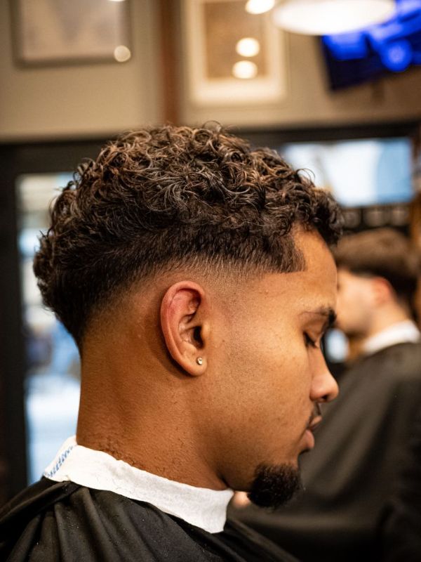 curly-buzz-cut-with-low-taper
