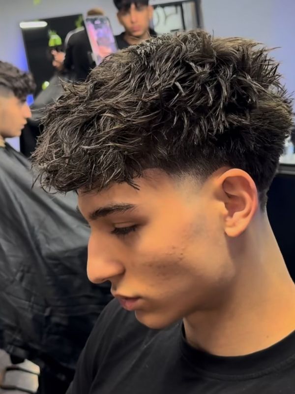 high-taper-fade-for-wavy-hair
